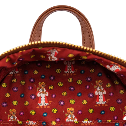 Close-up of a red bag with colorful patterns on a white background