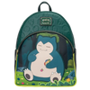 A Loungefly Pokémon Snorlax backpack featuring a large graphic of Snorlax sitting in a forest on the front pocket, with a dark green embossed top panel and lime green accents.