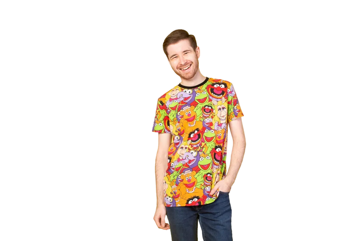 Person wearing a colorful t-shirt with cartoon character design on a yellow background