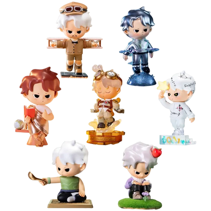 Set of small figurines with various hairstyles and outfits on a white background