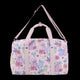 Pink duffel bag with cartoon animal and flower pattern on a white background
