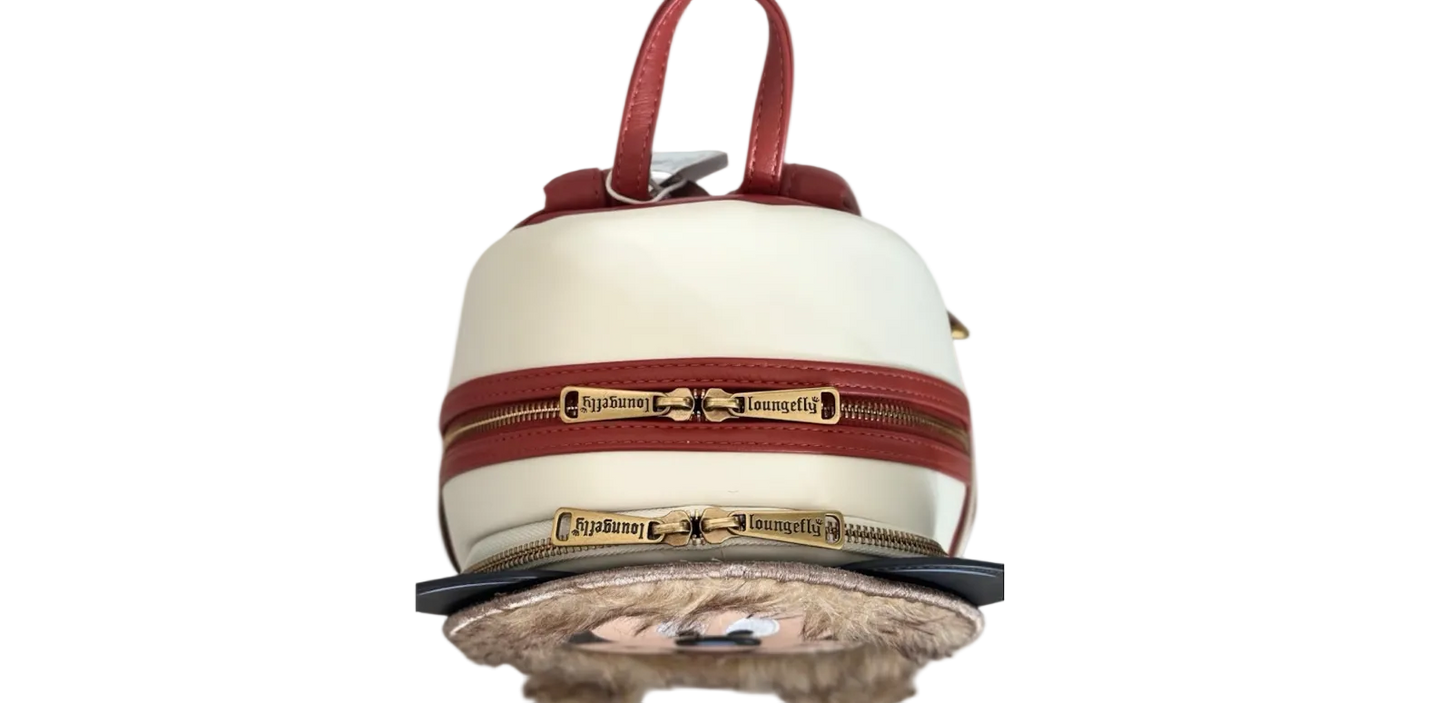 Small round bag with a red strap and gold zipper on a white background