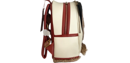 Backpack with red straps and fur trim on a white background