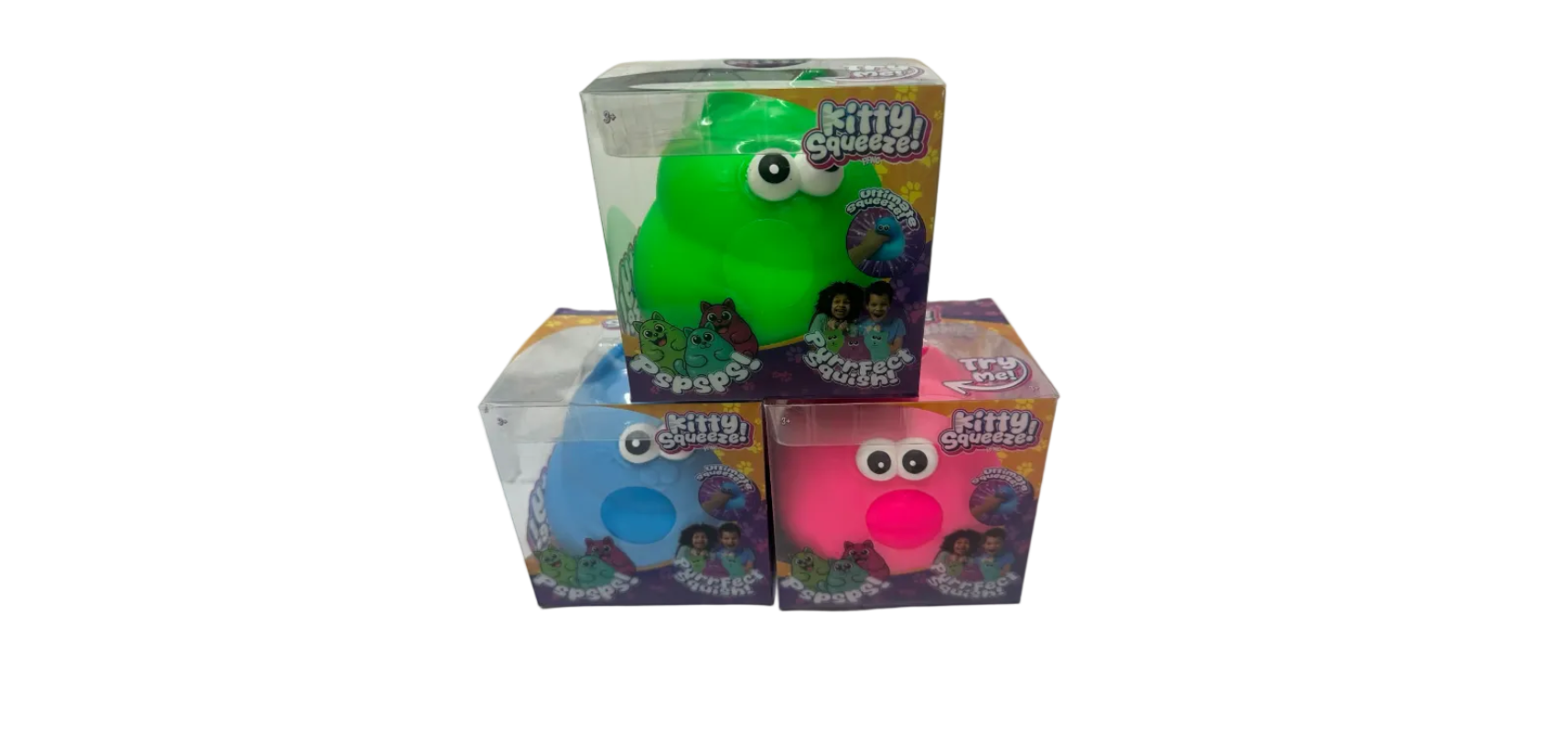 Green and pink 'Kitty Squish' toys with packaging on a white surface.
