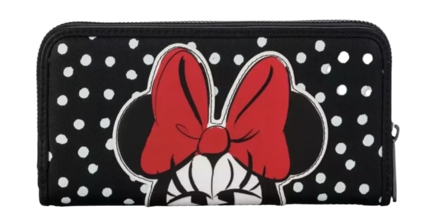 Black wallet with white polka dots and red bow design on a white background