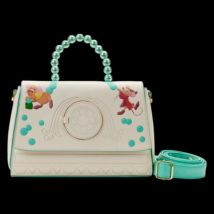 Handbag with cartoon characters and turquoise accents on a white background