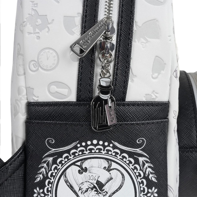 Close-up of a backpack with a character design and charm on a white background