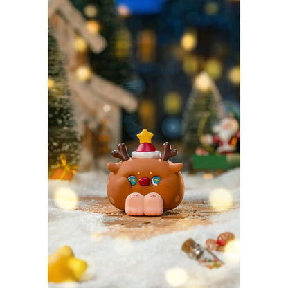 Christmas-themed figurine of a reindeer with a Santa hat on a snowy background with lights and decorations.