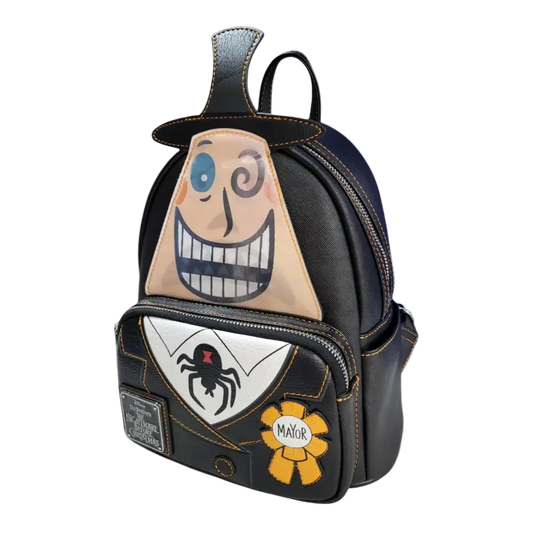 A black faux-leather mini backpack featuring a stylized Mayor from The Nightmare Before Christmas design, including a large smiling face on the front, a sheriff badge patch, and a yellow 'Mayor' ribbon. The Grotto Treasures Exclusive logo is visible in the top left corner.