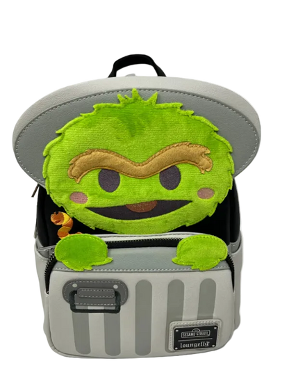 Backpack with a green character on top against a white background