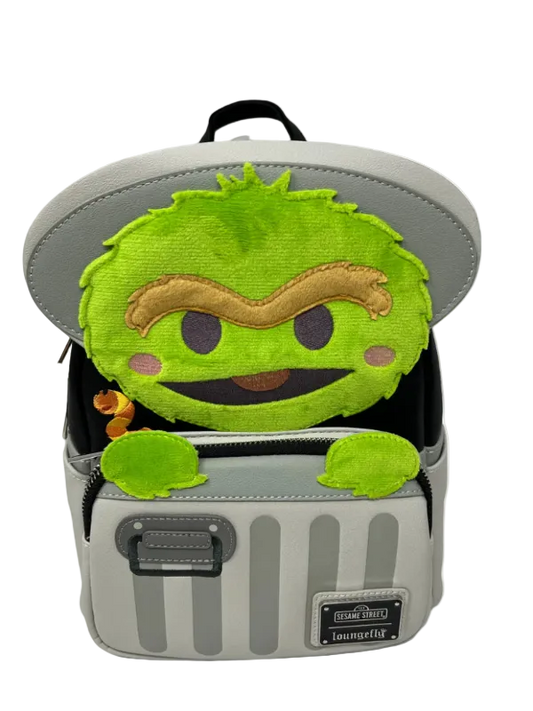 Backpack with a green character on top against a white background