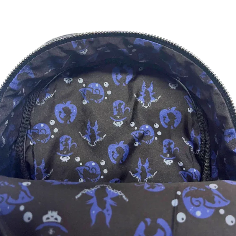 Close-up of a dark fabric with blue and white patterns on a white background