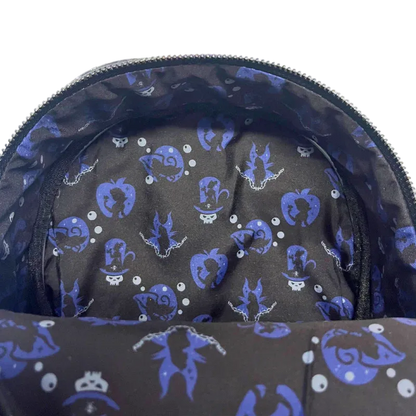 Close-up of a dark fabric with blue and white patterns on a white background