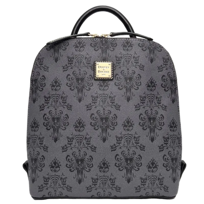 A gray and black damask-patterned backpack with a top handle and a gold-tone Disney on Parade logo plaque on the front, set against a neutral gray background.