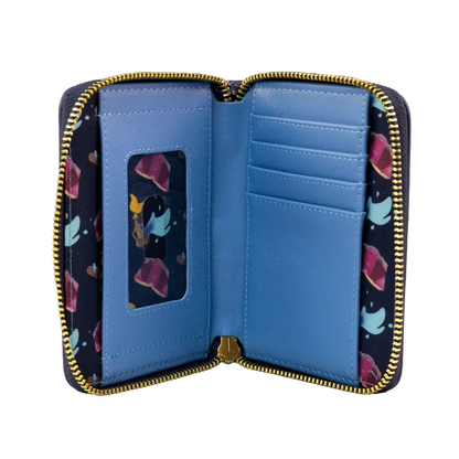 An open zip-around wallet shown from the inside, featuring a bright blue interior, gold-tone zipper trim, multiple card slots, and a dark navy patterned lining with colorful abstract shapes.
