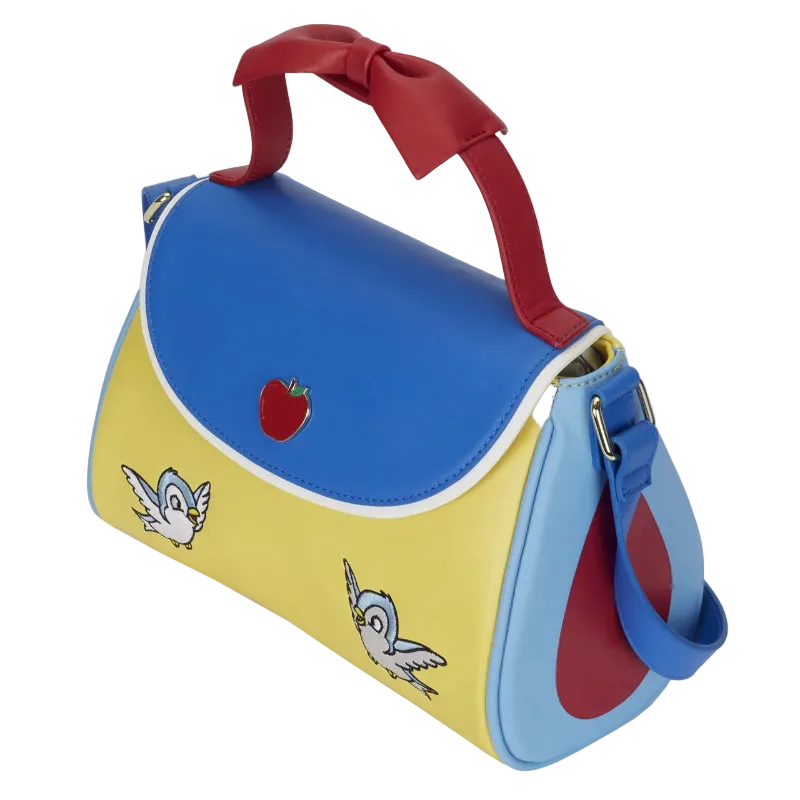 Colorful handbag with red handle, blue top, and yellow base featuring cartoon characters and an apple.