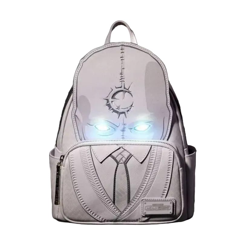 Backpack with glowing eyes on a dark background