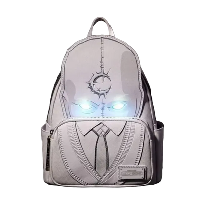 Backpack with glowing eyes on a dark background