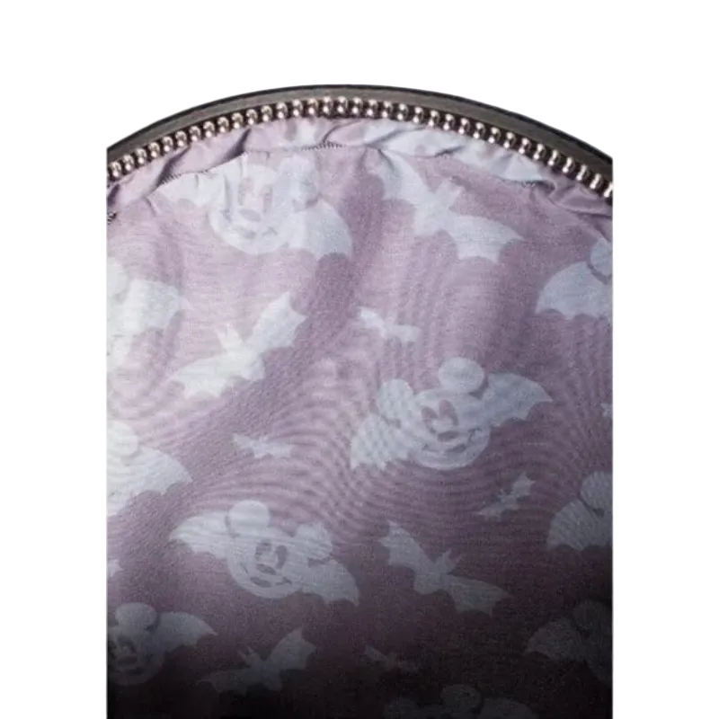 Close-up of a purple pouch with white floral patterns on a white background