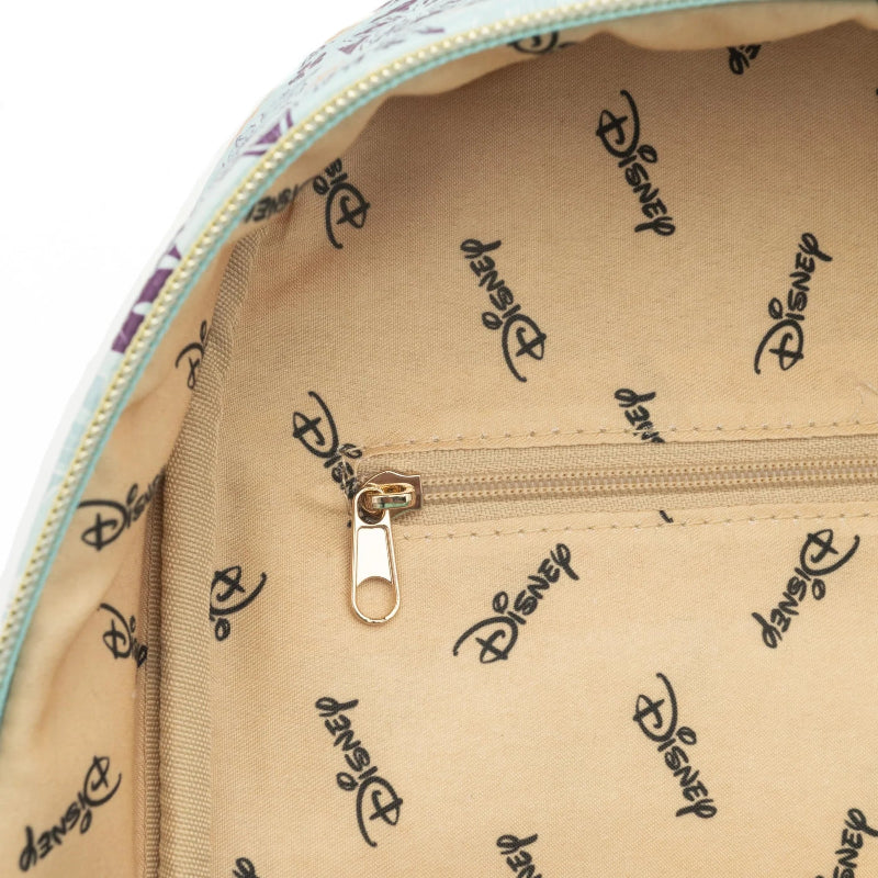 Close-up of the interior of a Disney bag, showing a beige nylon lining printed with a repeating black Disney logo and a gold zipper pull.