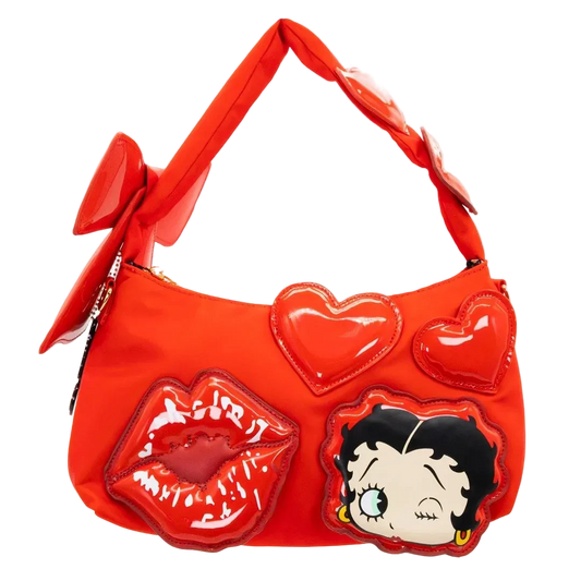 Red handbag with heart, lips, and cartoon character design on a white background