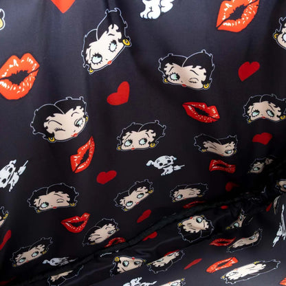 Fabric with Betty Boop and red lip prints on a black background