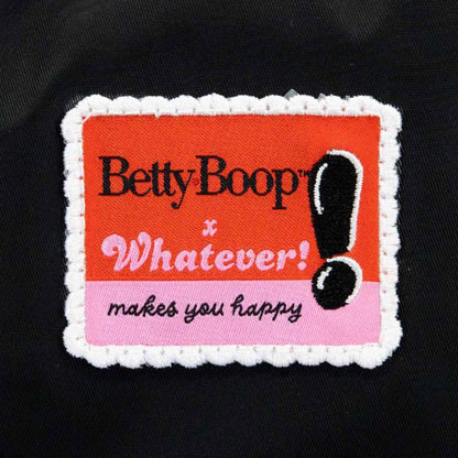 Patch with 'Betty Boop Whatever! makes you happy' text on a black background