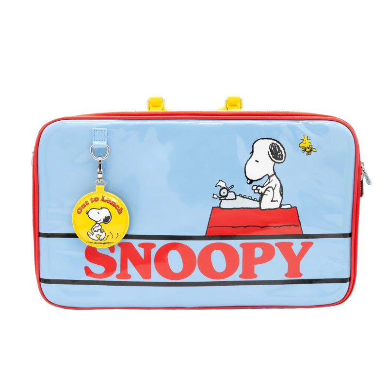 Snoopy-themed laptop sleeve with character illustration and 'Snoopy' text on a light blue background.