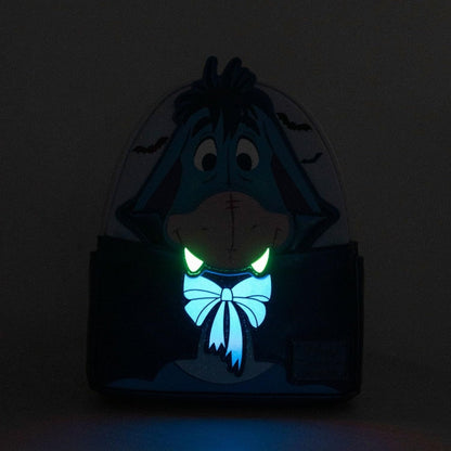 Cartoon character with glowing eyes in a dark setting
