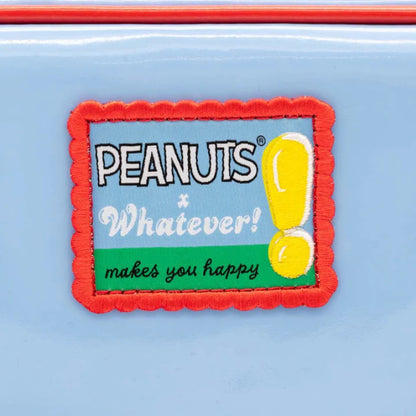 Peanuts patch with 'Whatever! Makes you happy' text on a light blue background
