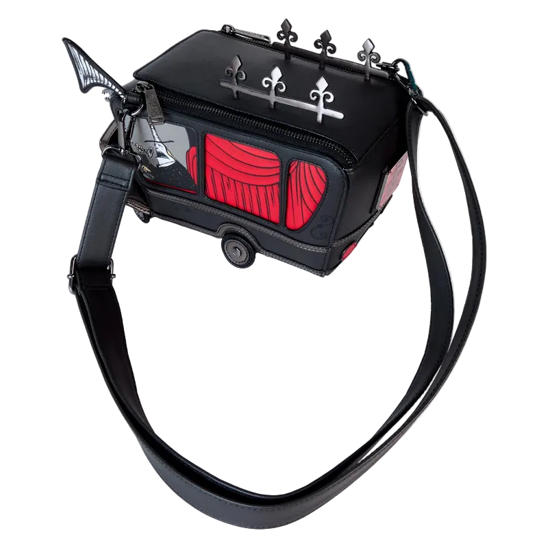 Black handbag with red accents and decorative elements on a white background