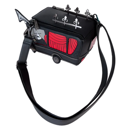 Black handbag with red accents and decorative elements on a white background