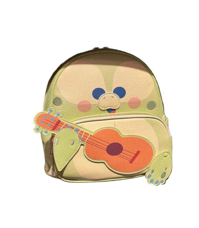 Children's backpack with a cartoon character design on a shelf.