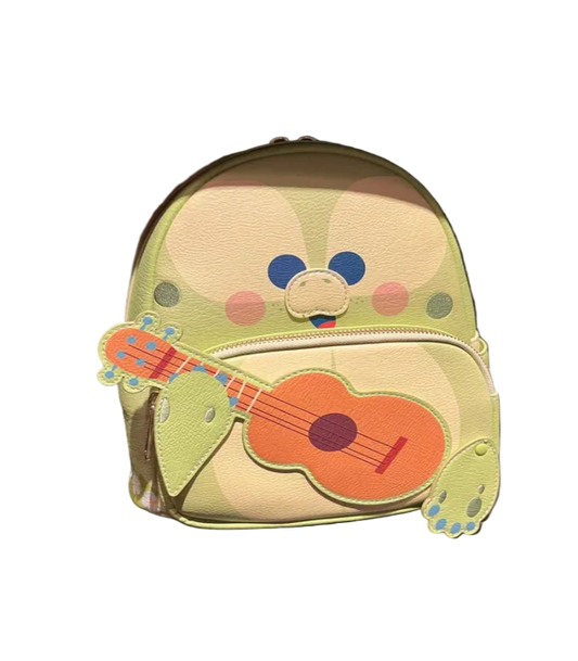 Children's backpack with a cartoon character design on a shelf.