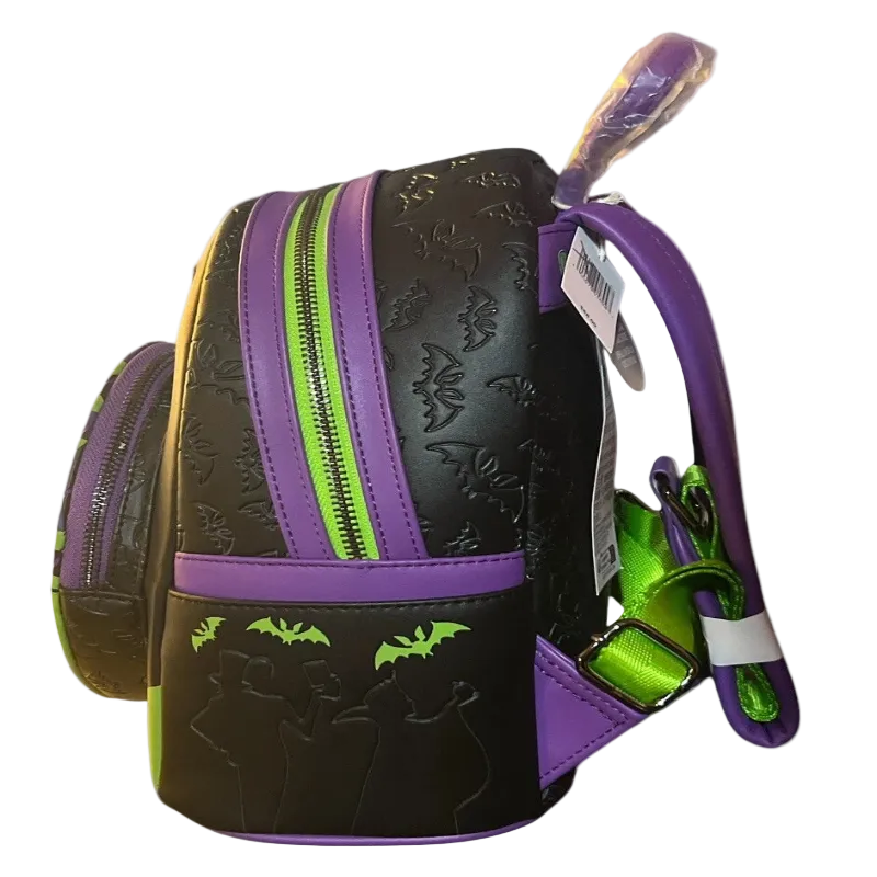 Black backpack with purple accents and green bat designs on a white background