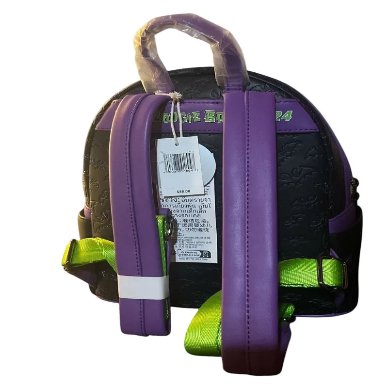 Backpack with purple straps and green accents on a white background