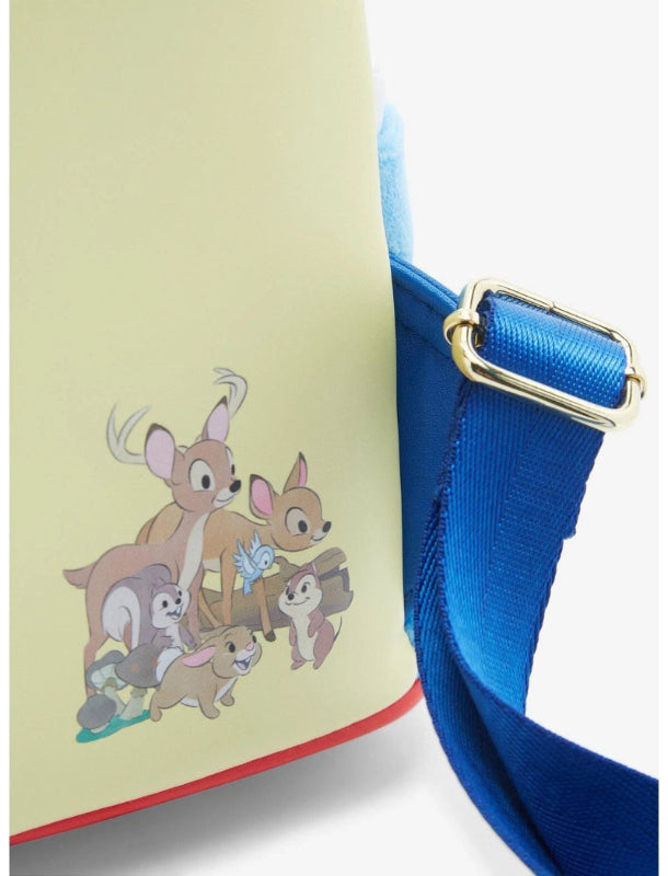 Product with a blue strap and a design of animals on a light green background