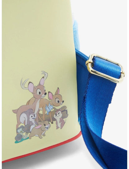 Product with a blue strap and a design of animals on a light green background
