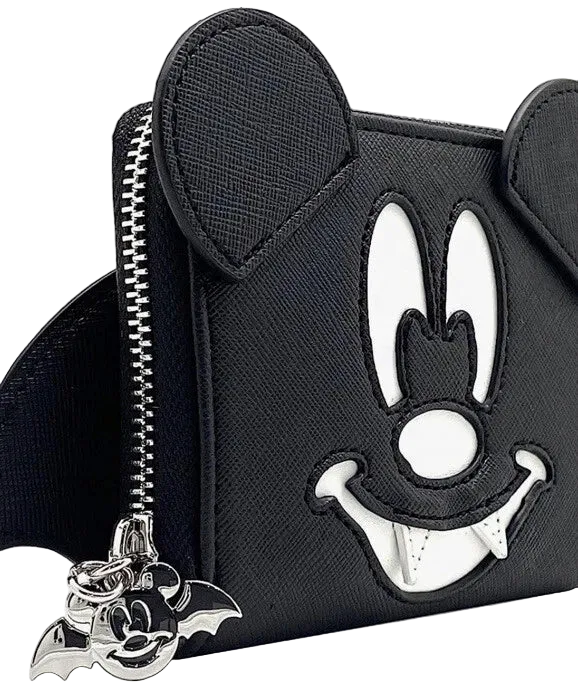 Black textured faux-saffiano coin purse featuring a cutout of Mickey Mouse's face and a silver bat-shaped charm hanging from the zipper.