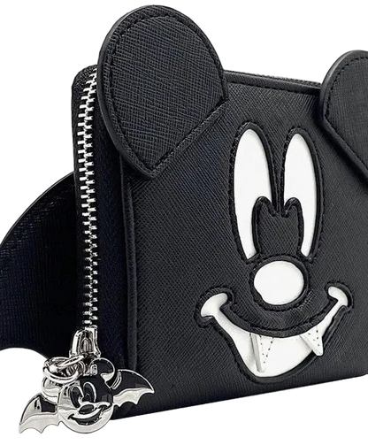 Black textured faux-saffiano coin purse featuring a cutout of Mickey Mouse's face and a silver bat-shaped charm hanging from the zipper.