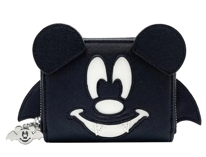 A black zip-around coin purse featuring a stylized Mickey Mouse face design in white and black, with mouse ears on top and small bat wings on the sides. A small silver Mickey-shaped charm hangs from the zipper on the left.