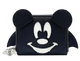 A black zip-around coin purse featuring a stylized Mickey Mouse face design in white and black, with mouse ears on top and small bat wings on the sides. A small silver Mickey-shaped charm hangs from the zipper on the left.