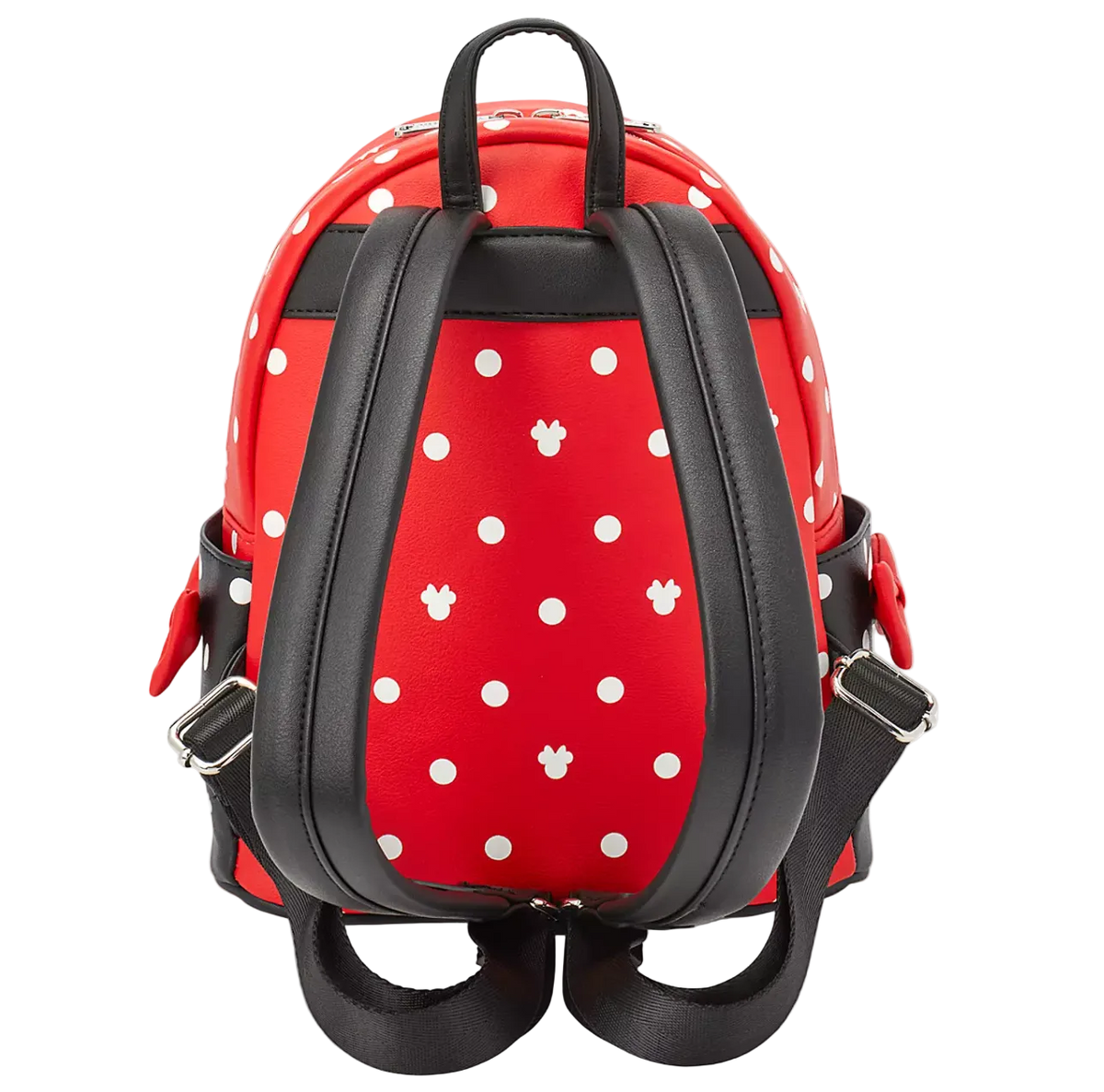Red and white polka dot backpack with black faux-leather straps and silver buckles, shown from the back on a white background.